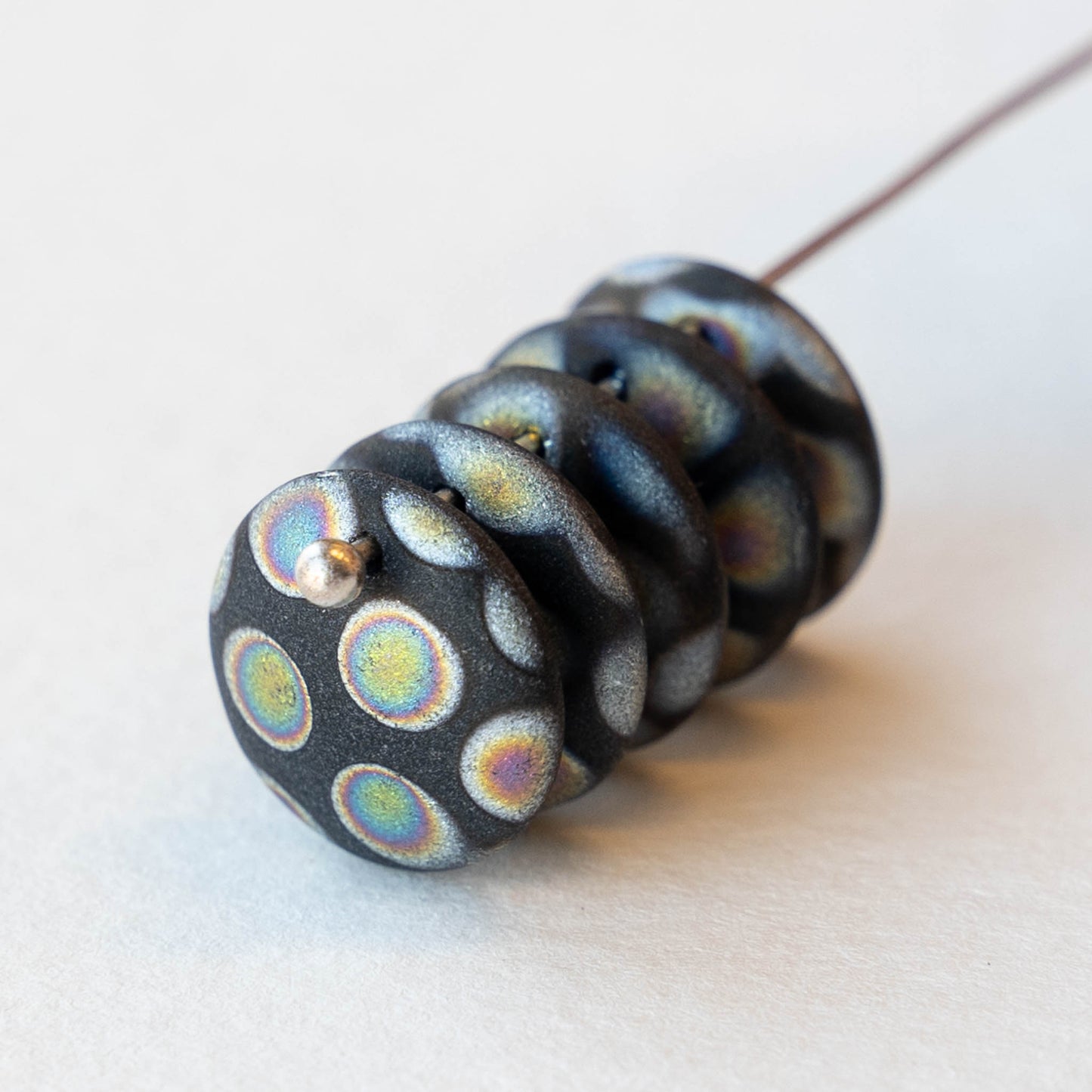 12mm Lentil Drop - Black Matte Peacock - 10 beads