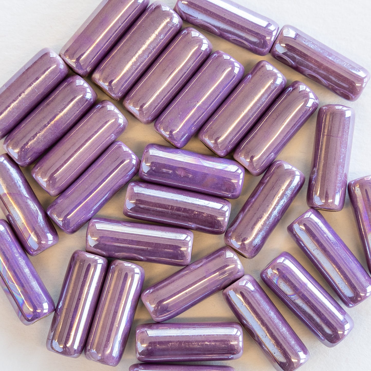 Load image into Gallery viewer, 6x17mm Glazed Ceramic Tube Beads - Iridescent Purple Passion - 8 or 24
