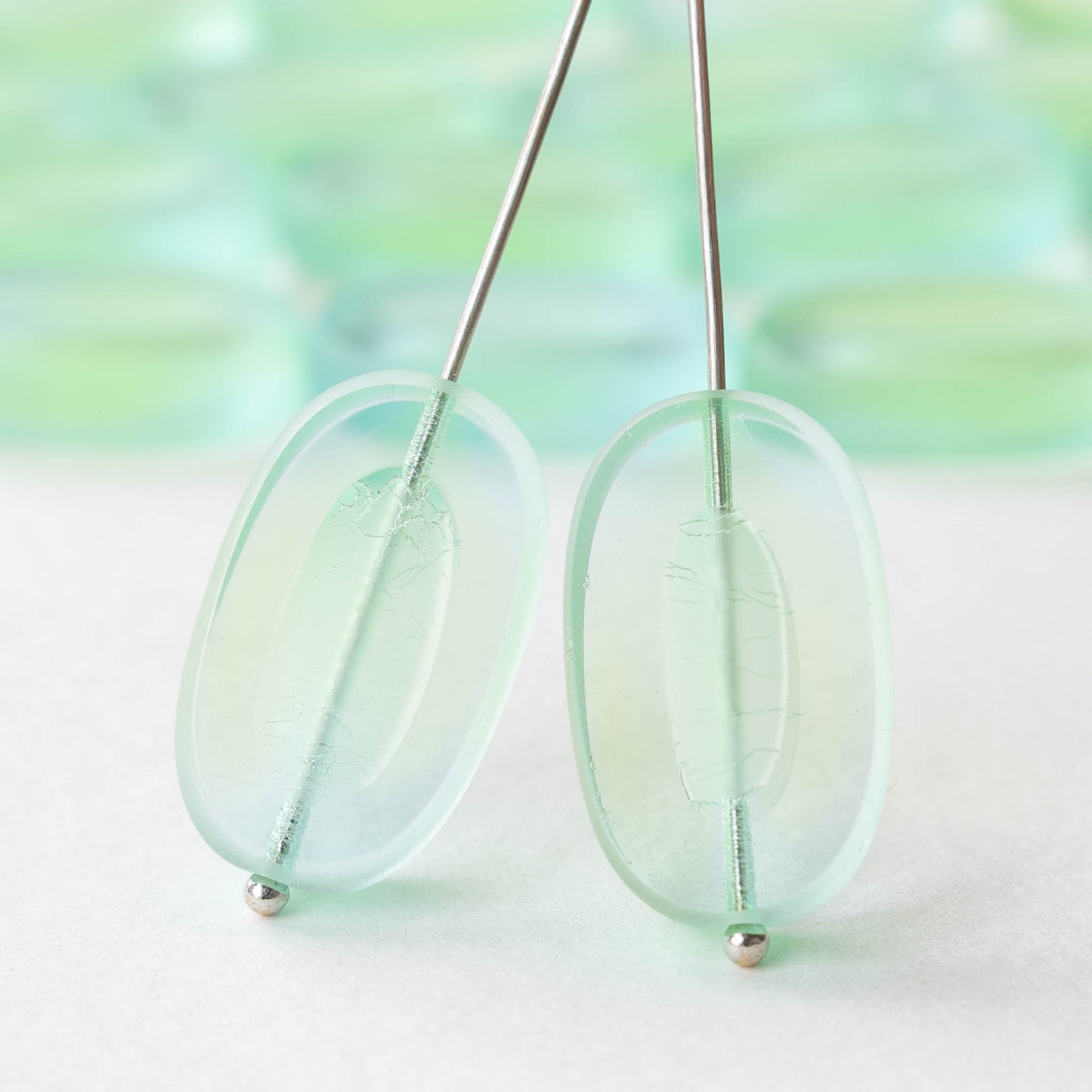 22x13mm Flat Glass Oval Beads - Transparent Light Blue Green - 8 beads