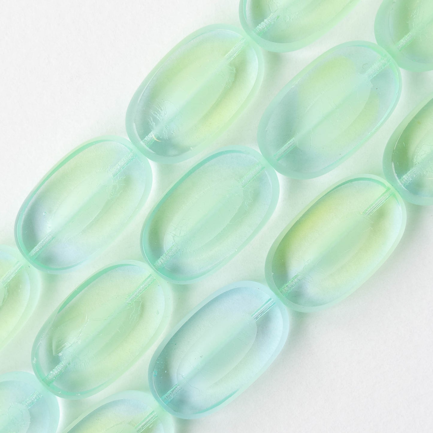 22x13mm Flat Glass Oval Beads - Transparent Light Blue Green - 8 beads
