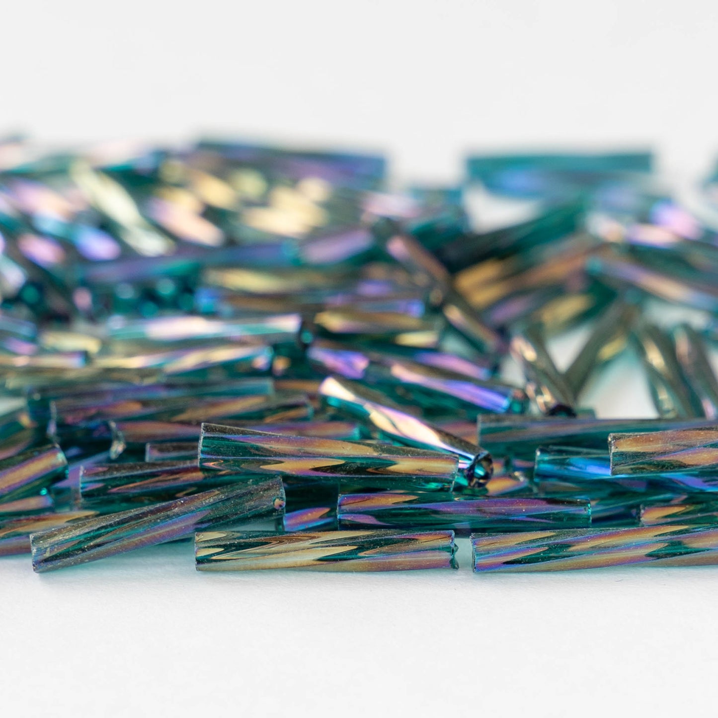 15mm Bugle Beads - Transparent Teal Rainbow - 200 Beads