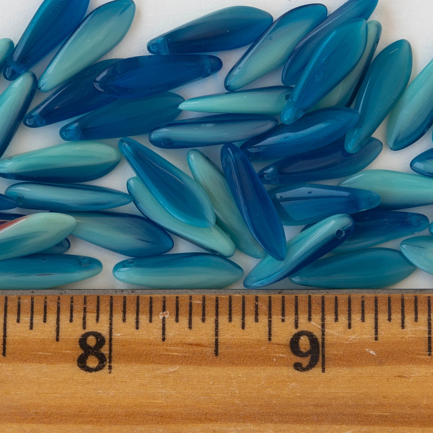 Load image into Gallery viewer, 16mm Dagger Beads - Blue Mixed Glass - 60 beads
