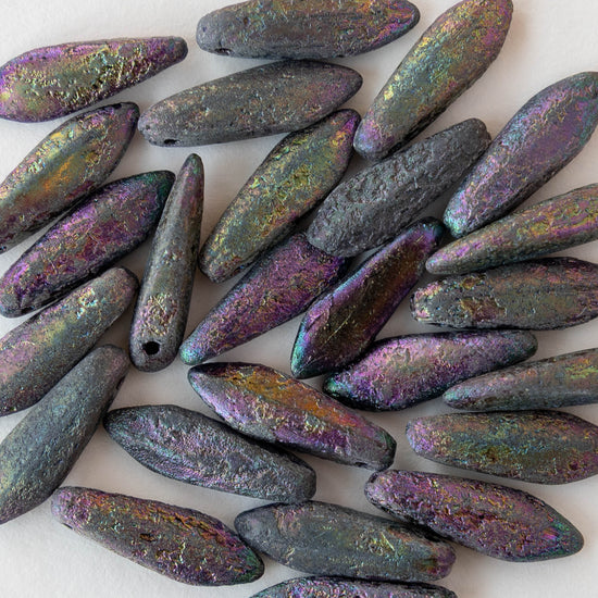 Iridescent beads on a white background