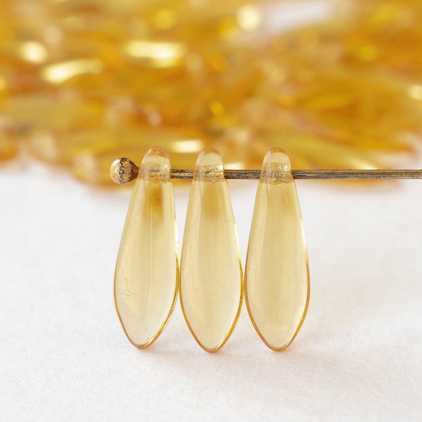 16mm Glass Dagger Beads - Transparent Medium Topaz - 50 beads