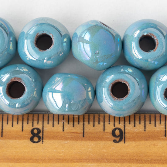 Load image into Gallery viewer, 16mm Glazed Ceramic Round Beads - Iridescent lt. Blue - 4 or 12
