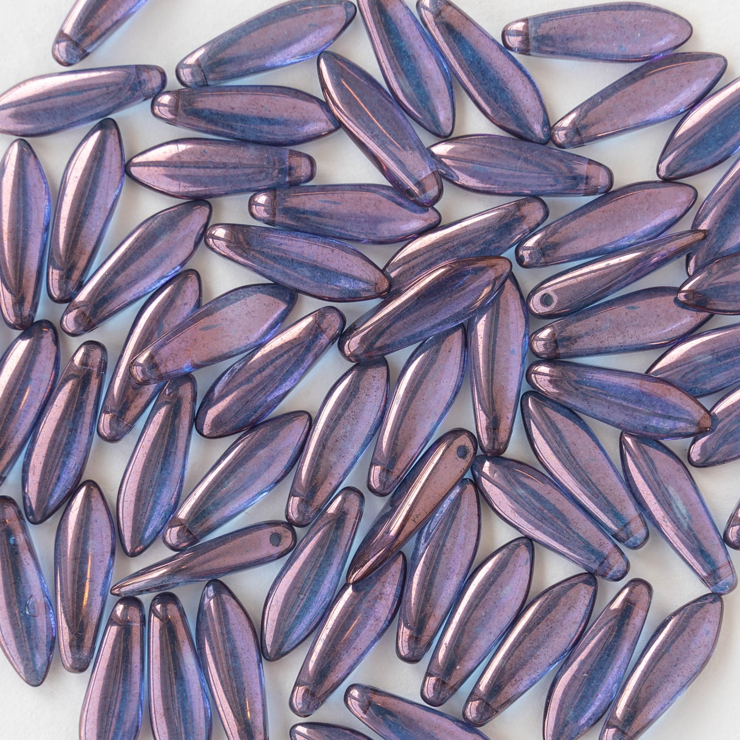 Load image into Gallery viewer, 16mm Dagger Beads - Amethyst Luster - 100 beads
