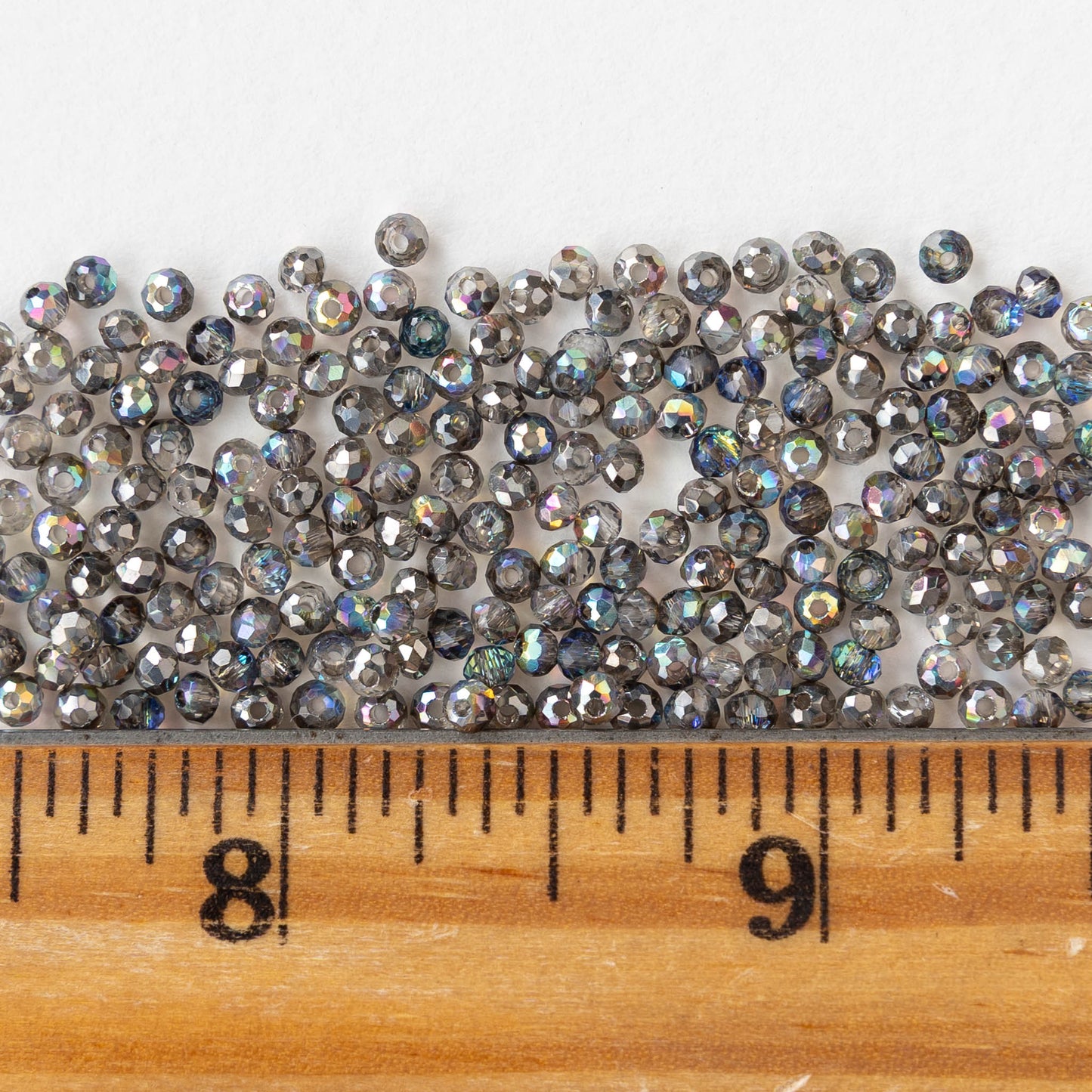 1mm Faceted Glass Rondelle Beads - Crystal Graphite AB - 100 beads