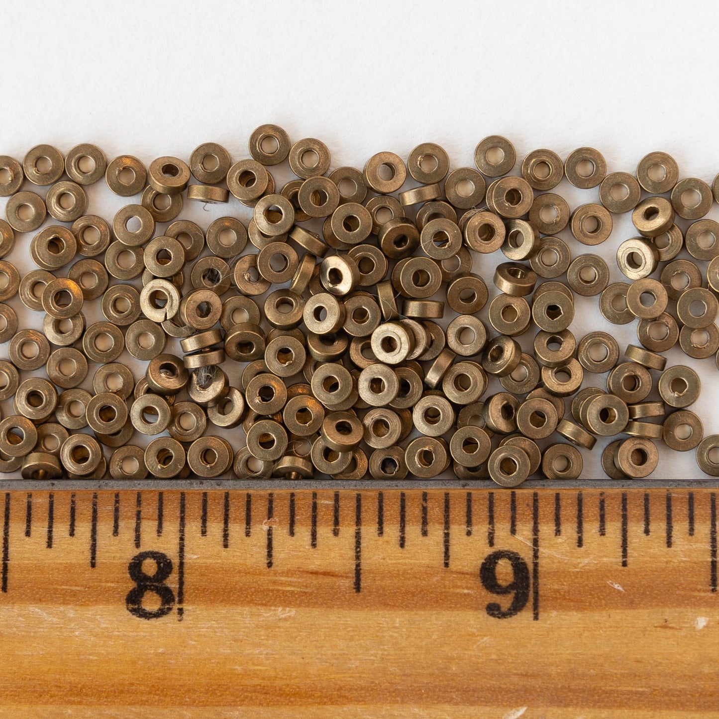 1x3mm Mini Metal Heishi Beads - Antiqued Brass - 100 Beads