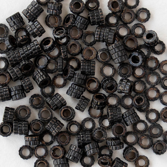 2.5mm Cog Spacer Beads - Black Brass - 3 Inches ` 100 Beads