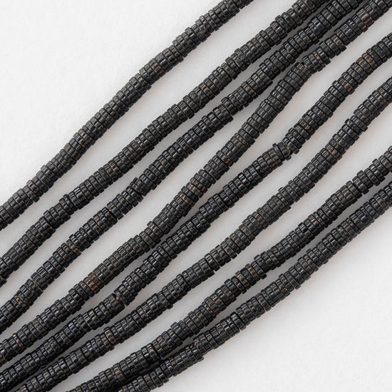 2.5mm Cog Spacer Beads - Black Brass - 3 Inches ` 100 Beads