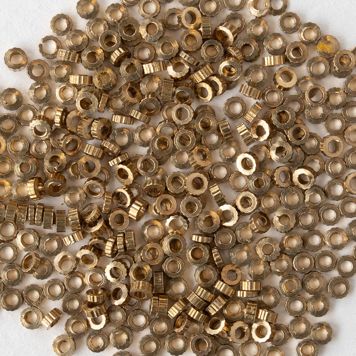 2.5mm Cog Spacer Beads - Antique Brass - 50 Beads