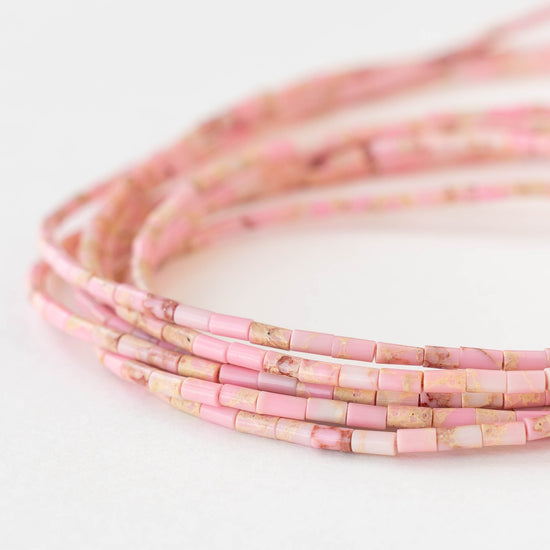 2.5x4mm Synthetic Impression Jasper Tiny Tube Beads - Pink - 15 inch strand ~85 beads