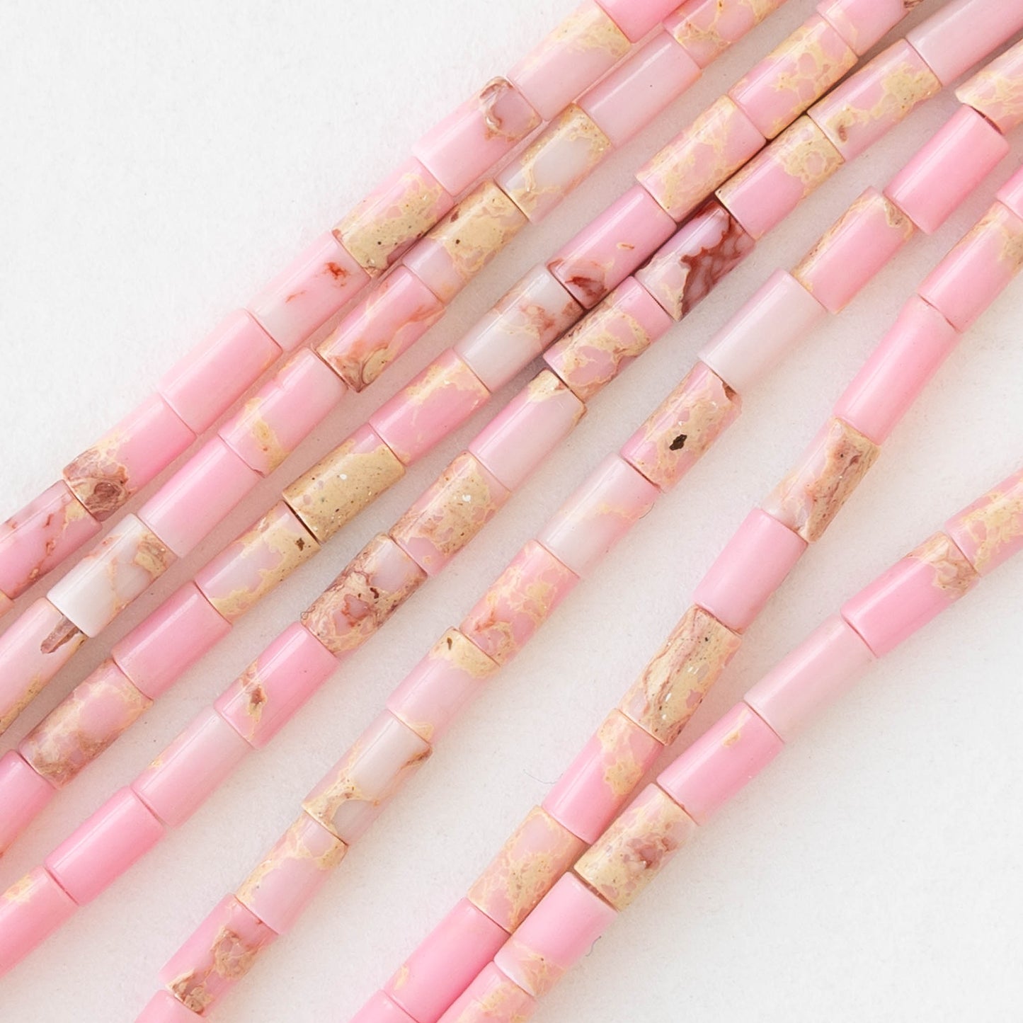 2.5x4mm Synthetic Impression Jasper Tiny Tube Beads - Pink - 15 inch strand ~85 beads