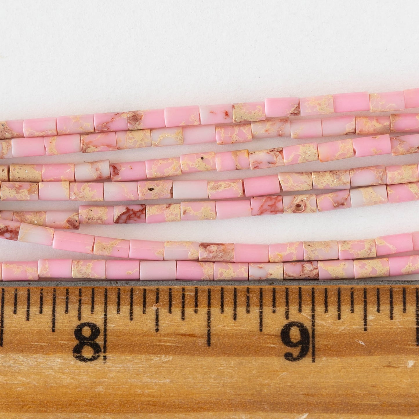 2.5x4mm Synthetic Impression Jasper Tiny Tube Beads - Pink - 15 inch strand ~85 beads