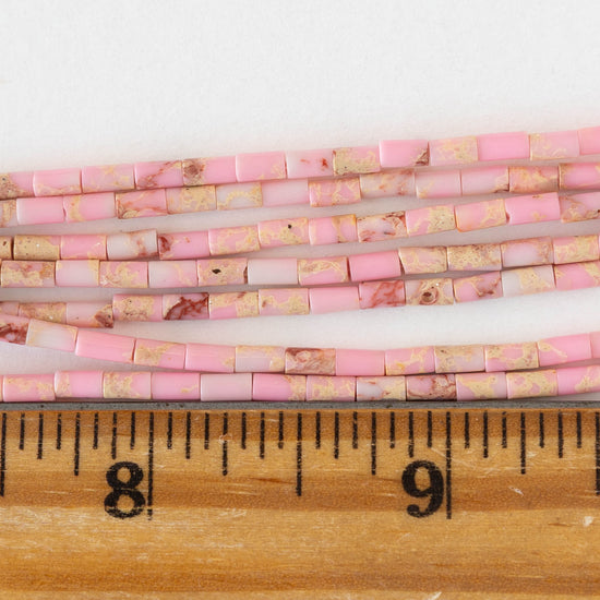 2.5x4mm Synthetic Impression Jasper Tiny Tube Beads - Pink - 15 inch strand ~85 beads
