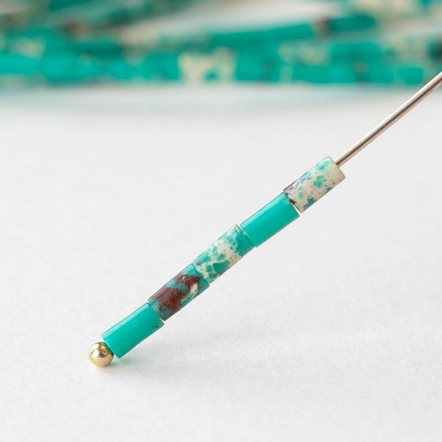 2.5x4mm Synthetic Impression Jasper Bugle Beads - Turquoise - 15 inch strand ~85 beads