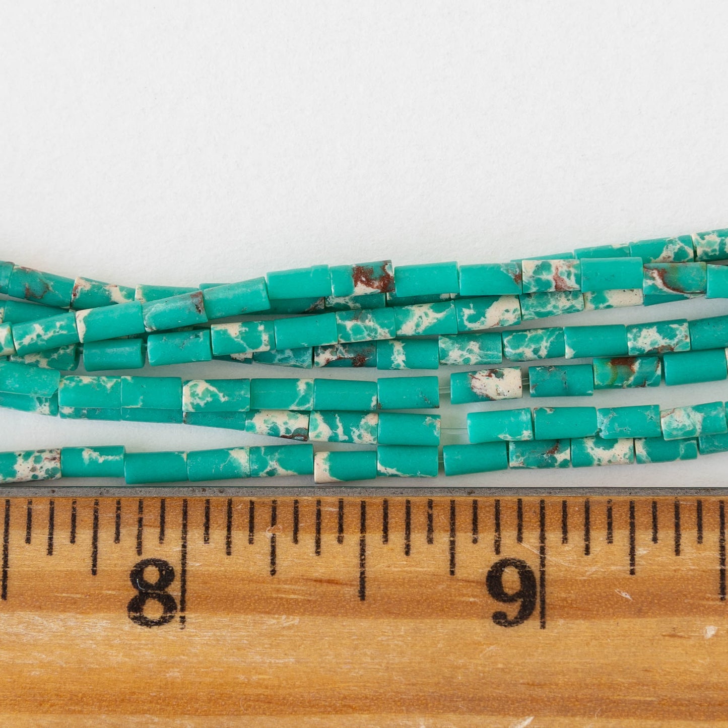 2.5x4mm Synthetic Impression Jasper Bugle Beads - Turquoise - 15 inch strand ~85 beads