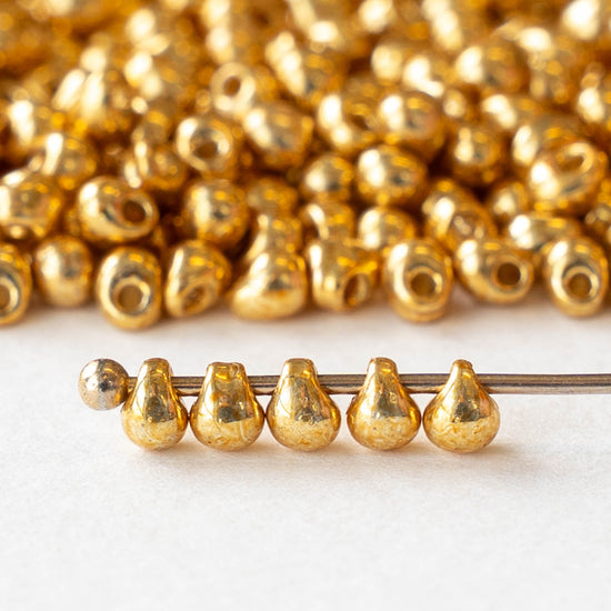 2.8mm Glass Magatama Teardrop Beads - Metallic Gold - 10 grams