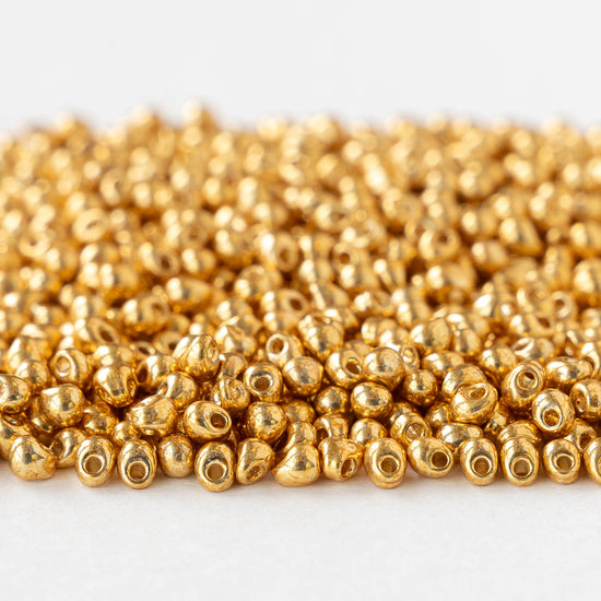 2.8mm Glass Magatama Teardrop Beads - Metallic Gold - 10 grams