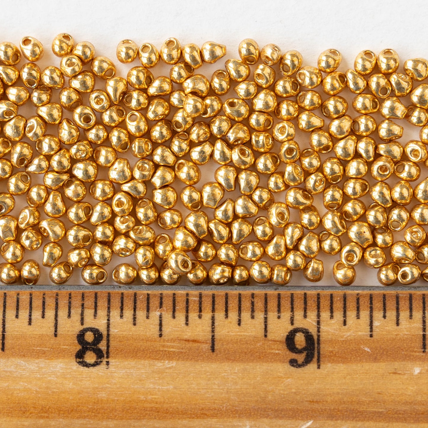 2.8mm Glass Magatama Teardrop Beads - Metallic Gold - 10 grams