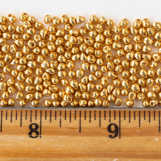 2.8mm Glass Magatama Teardrop Beads - Metallic Gold - 10 grams
