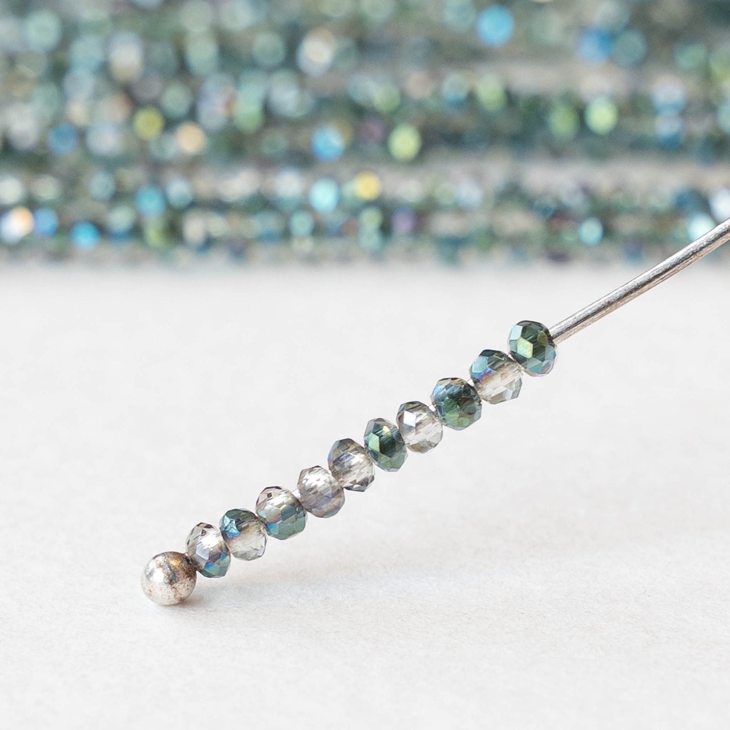 2mm Firepolished Rondelle Beads - Crystal Green AB - 15 inch strand ~200 beads