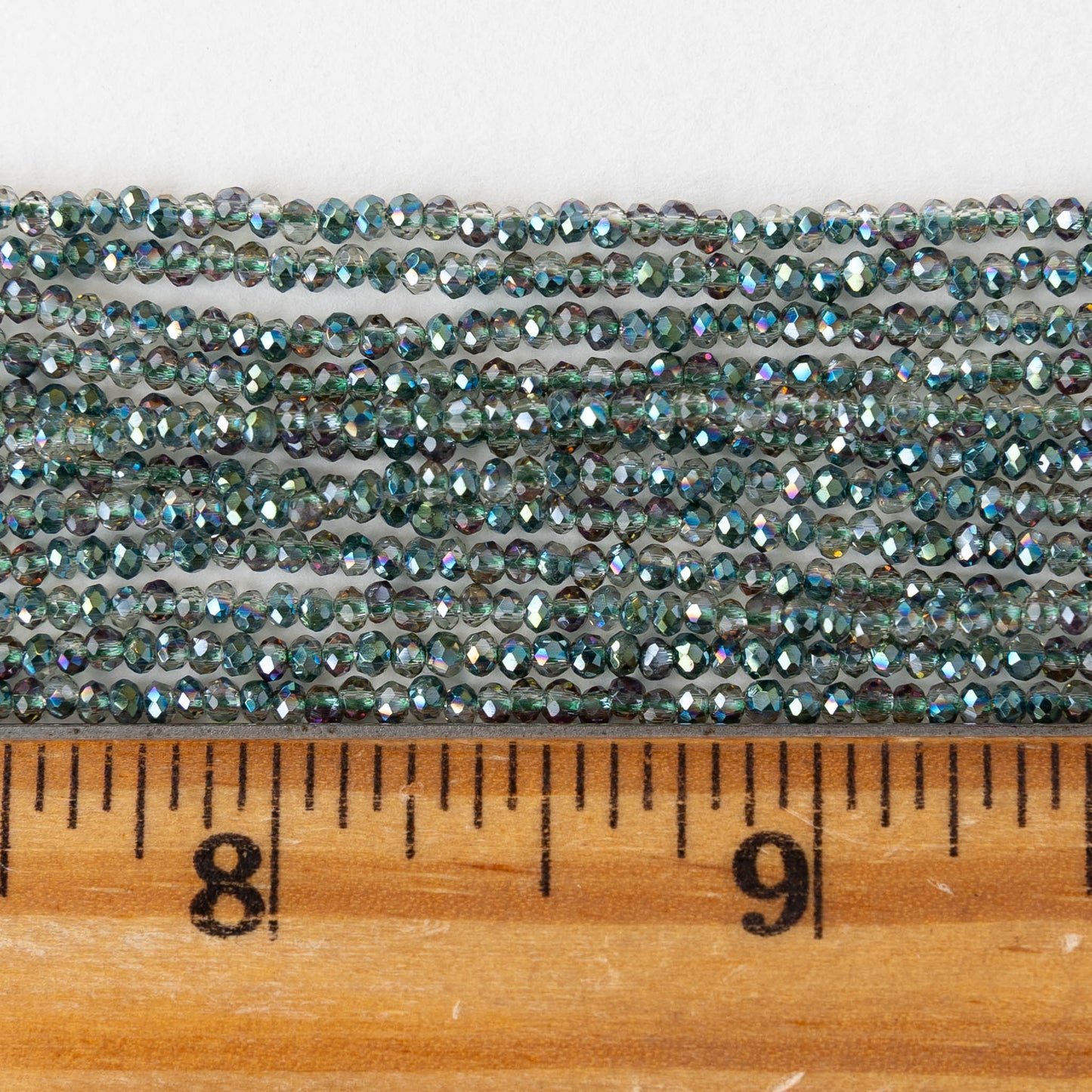 2mm Firepolished Rondelle Beads - Crystal Green AB - 15 inch strand ~200 beads