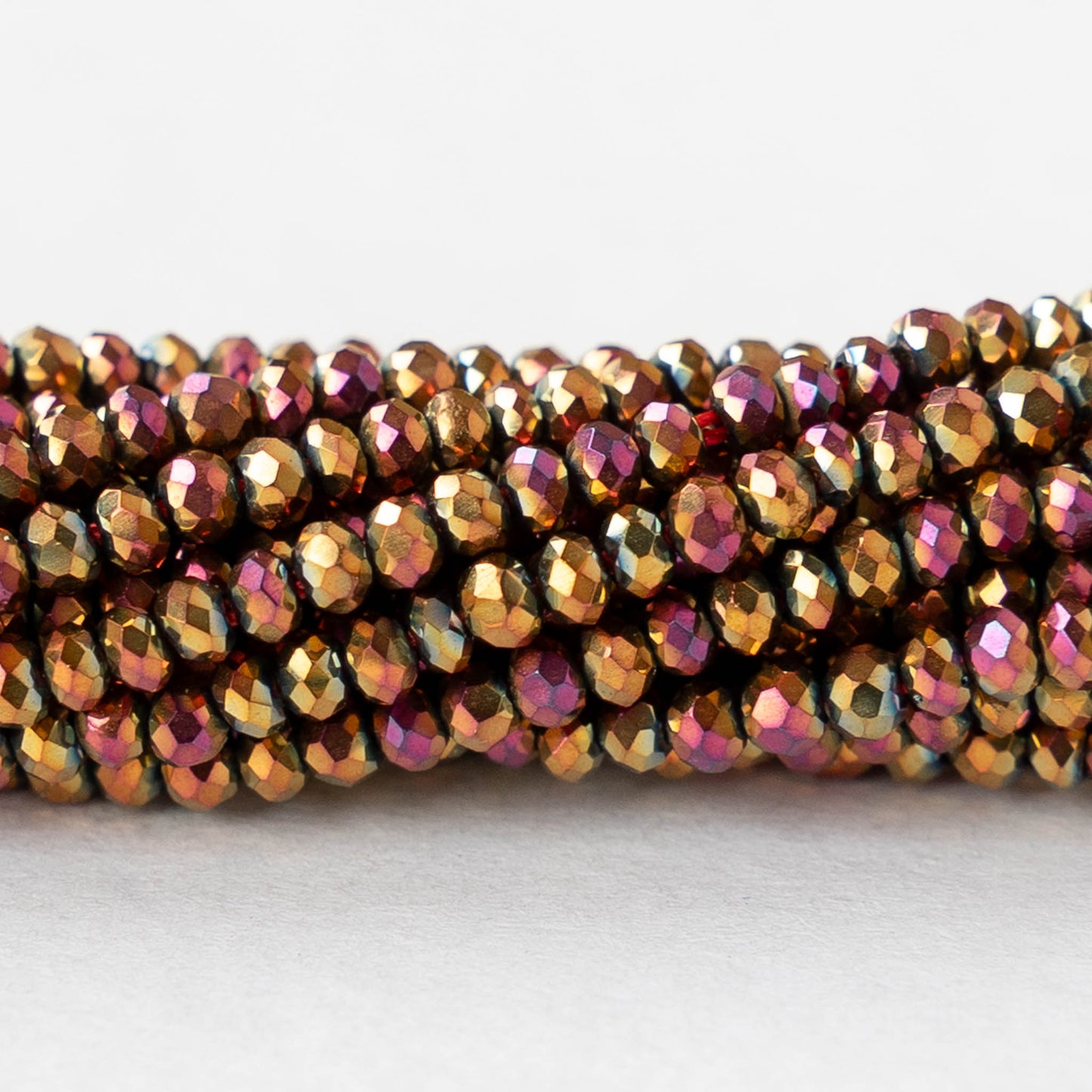 2mm Firepolished Rondelle Beads - Gold Pink Iris - 15 inch strand ~200 beads