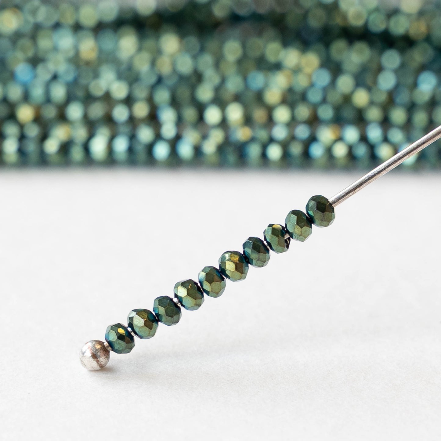 2mm Firepolished Rondelle Beads - Green Iris - 15 inch strand ~200 beads