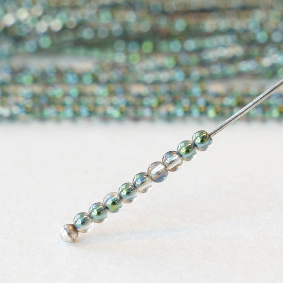 2mm Round Glass Beads - Crystal Green AB - 15 inch strand ~200 beads