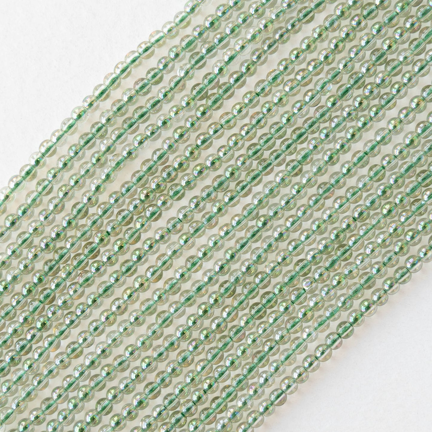 2mm Round Glass Beads - Crystal Green Luster - 15 inch strand ~200 beads