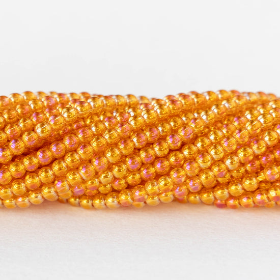 2mm Round Glass Beads - Orange AB - 15 inch strand ~200 beads