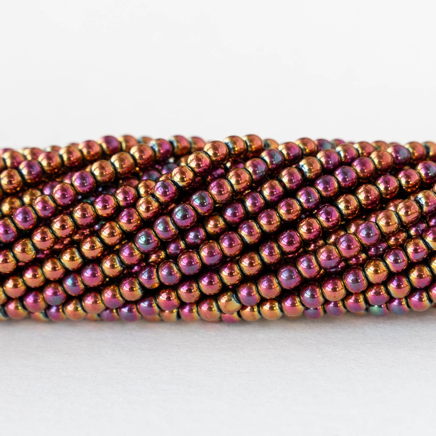 2mm Round Glass Beads - Purple Gold Iris - 15 inch strand ~200 beads