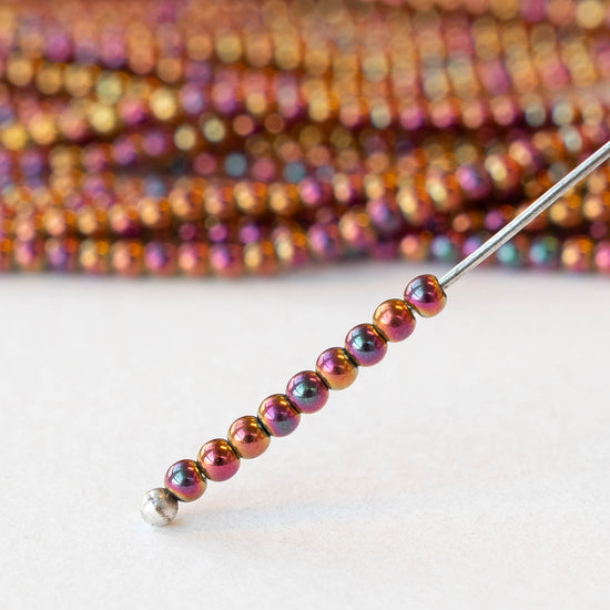 2mm Round Glass Beads - Purple Gold Iris - 15 inch strand ~200 beads