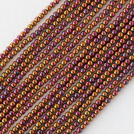 2mm Round Glass Beads - Purple Gold Iris - 15 inch strand ~200 beads