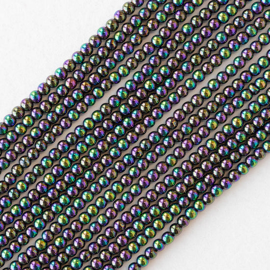 2mm Round Glass Beads - Purple Green Iris - 15 inch strand ~200 beads