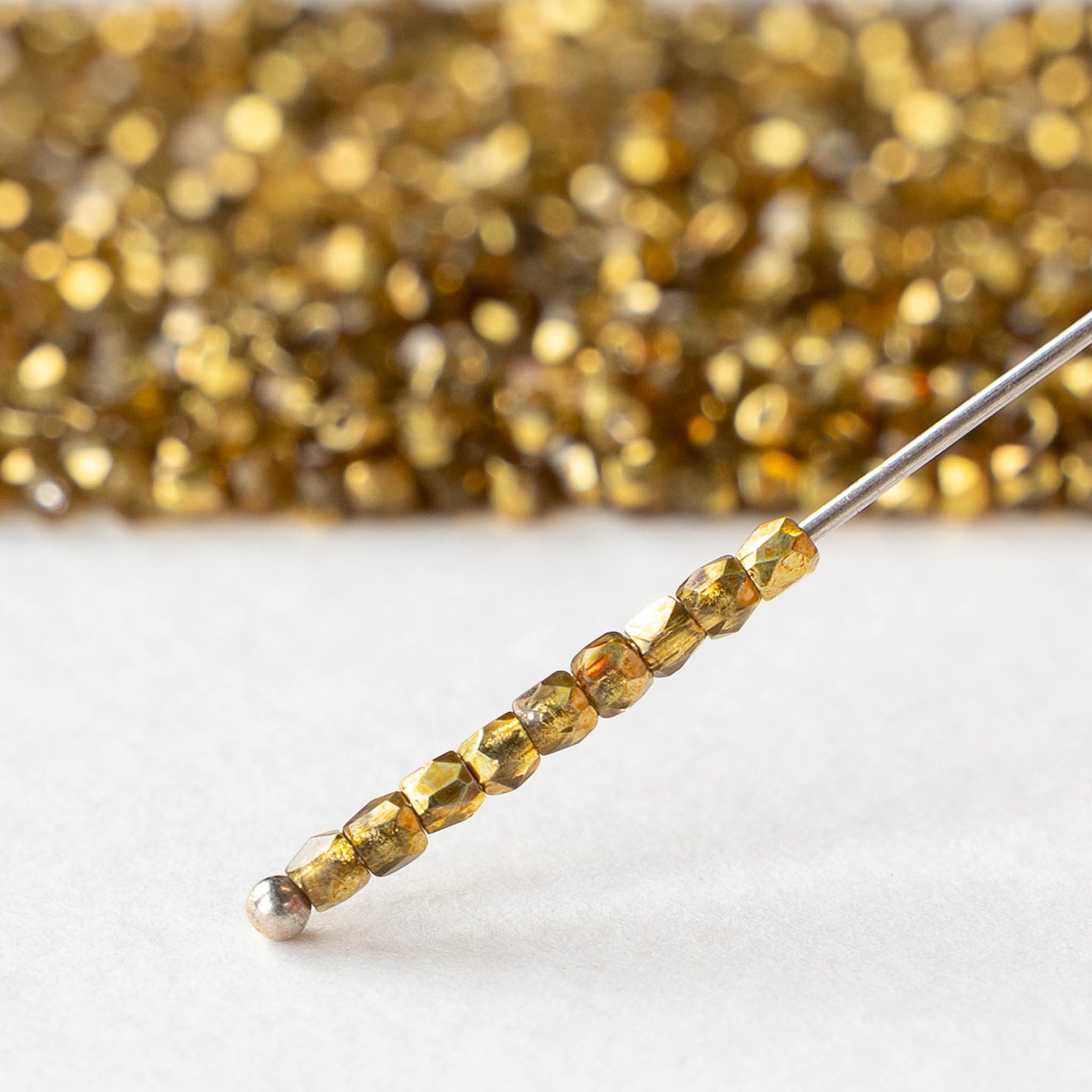 2mm Round Firepolished Beads - Crystal Apricot Metallic - 50 beads