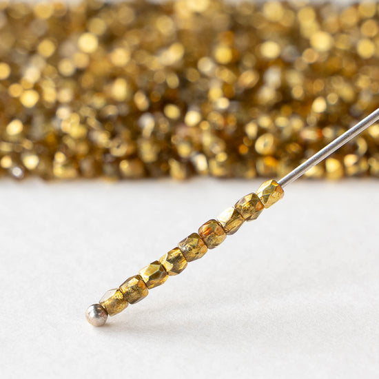 2mm Round Firepolished Beads - Crystal Apricot Metallic - 50 beads
