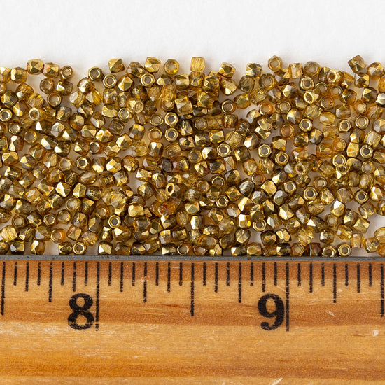 2mm Round Firepolished Beads - Crystal Apricot Metallic - 50 beads