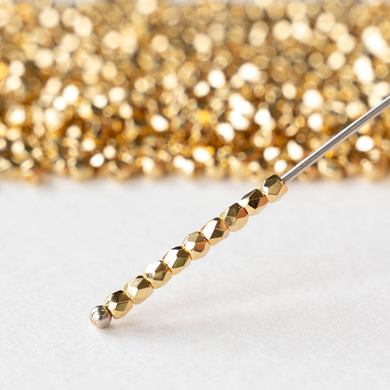 2mm Round Firepolished Beads - Gold - 50 beads