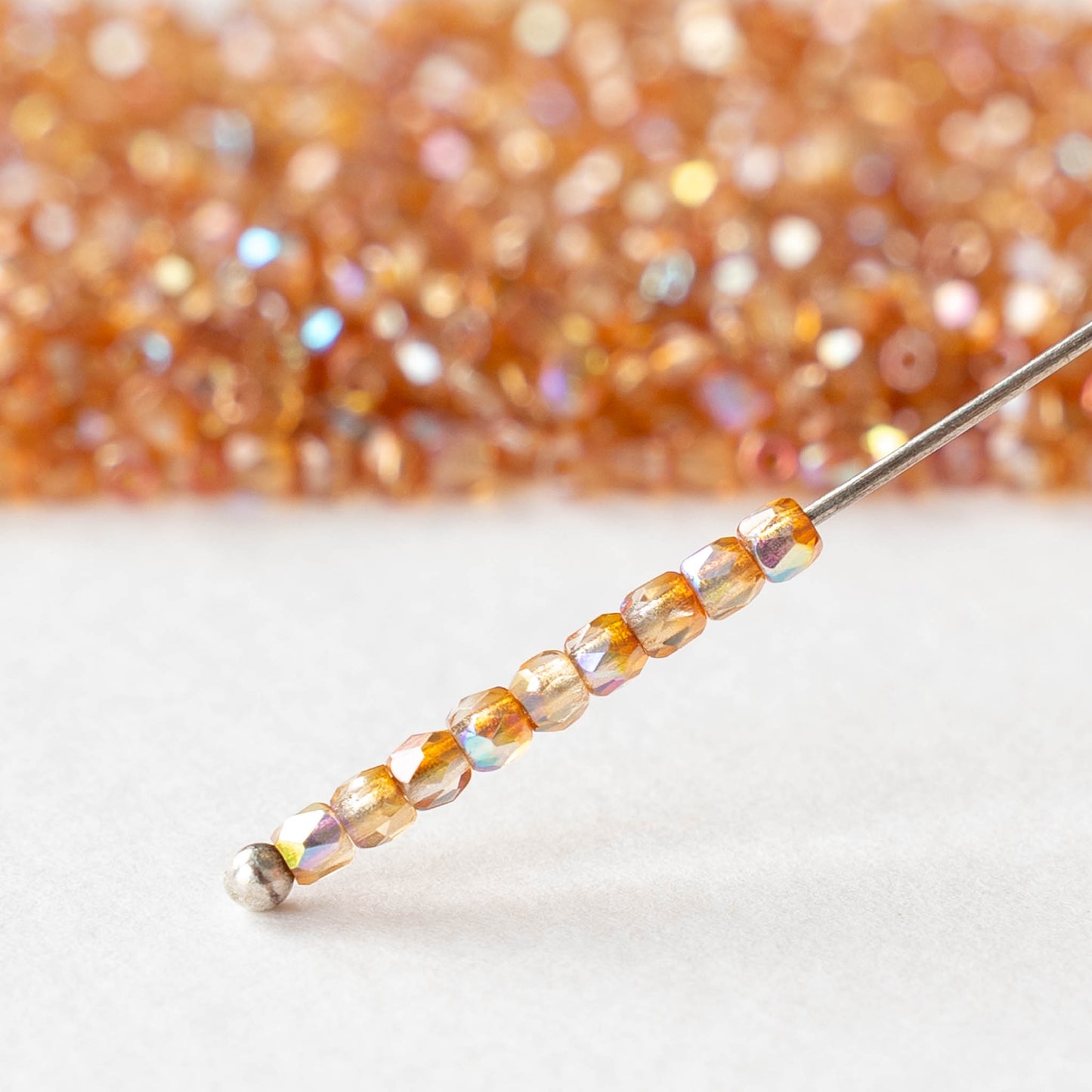 2mm Round Firepolished Beads - Crystal Orange AB - 50 beads