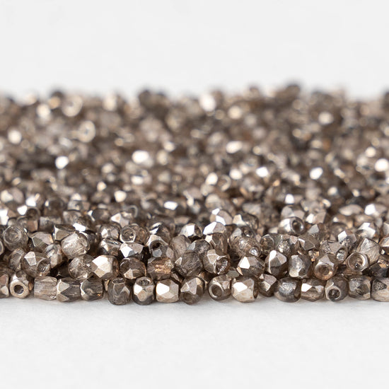 2mm Round Firepolished Beads - Crystal Smoky Metallic - 50 beads
