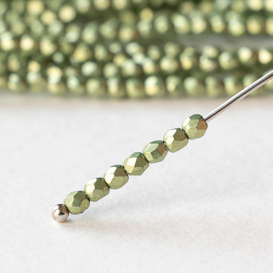 2mm Round Firepolished Beads - Saturated Metallic Greenery - 50 beads