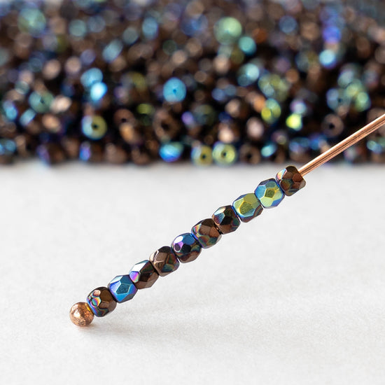 2mm Round Firepolished Beads - Jet Bronze AB - 50 beads