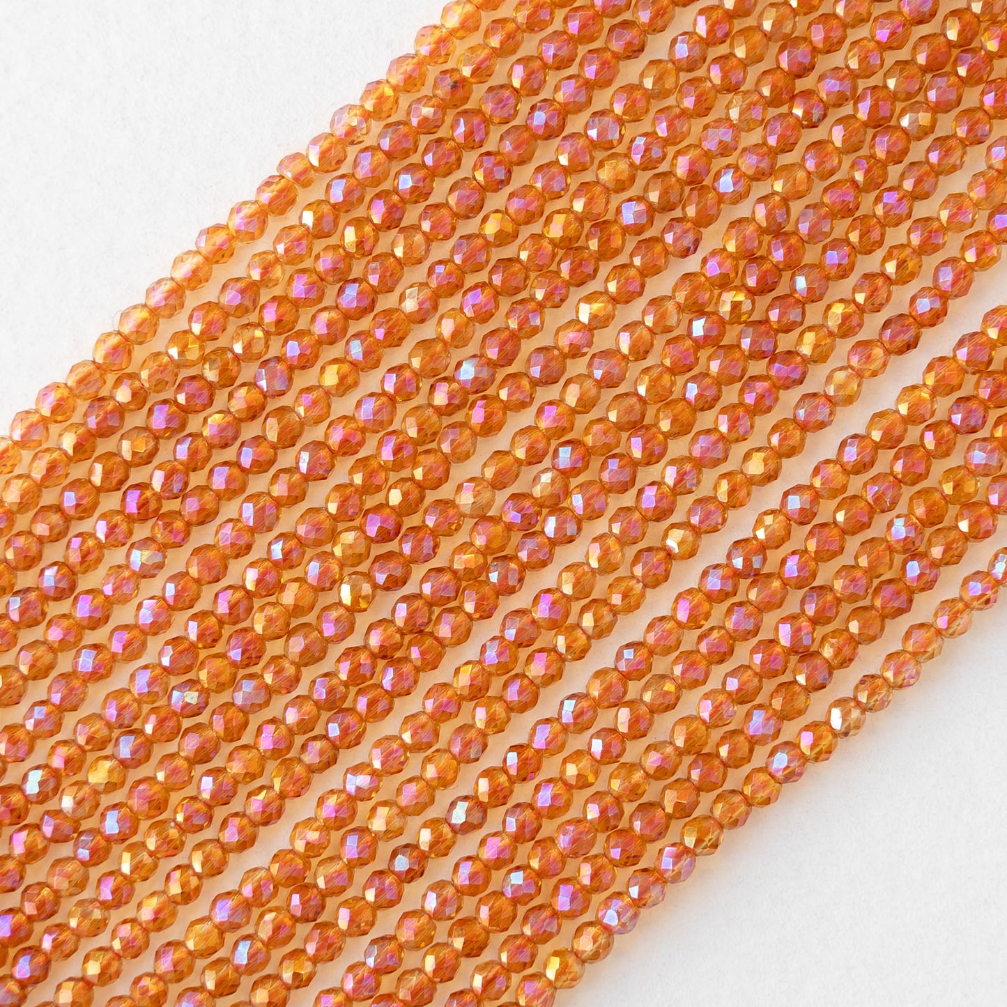 2mm Round Firepolished Beads - Orange AB - 15 inch strand ~200 beads