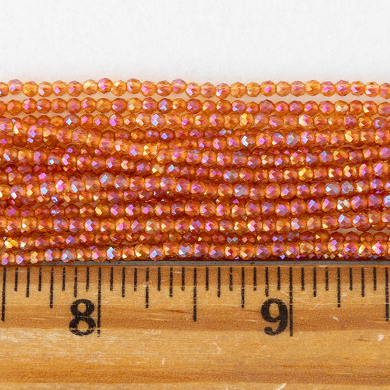 2mm Round Firepolished Beads - Orange AB - 15 inch strand ~200 beads