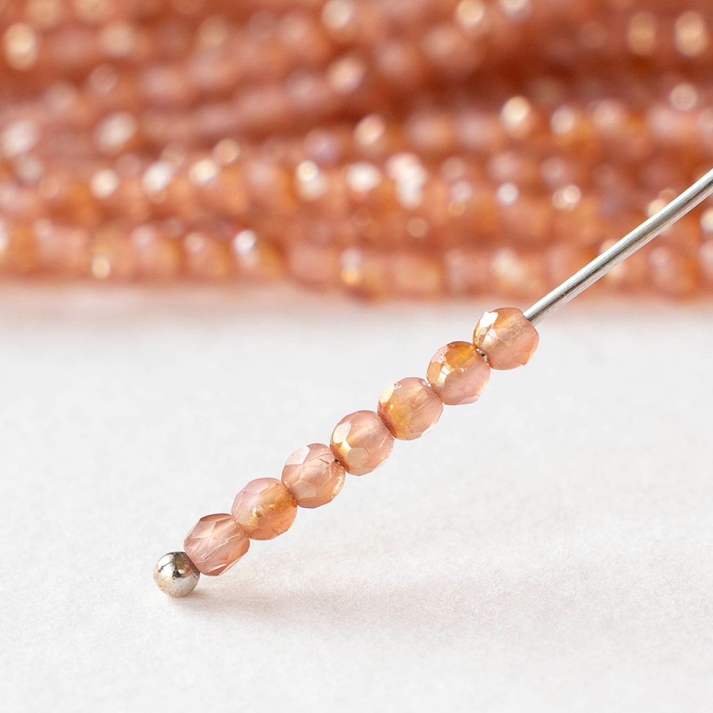 2mm Round Firepolished Beads - Milky Pink Celsian - 50 beads