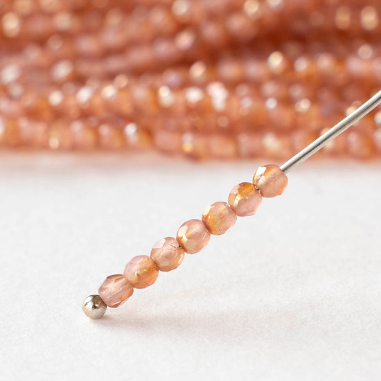 2mm Round Firepolished Beads - Milky Pink Celsian - 50 beads