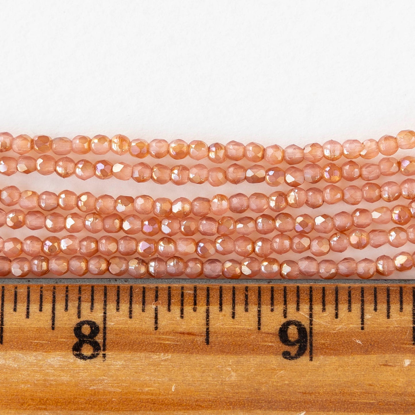 2mm Round Firepolished Beads - Milky Pink Celsian - 50 beads