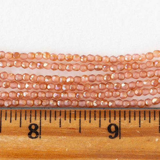 2mm Round Firepolished Beads - Milky Pink Celsian - 50 beads